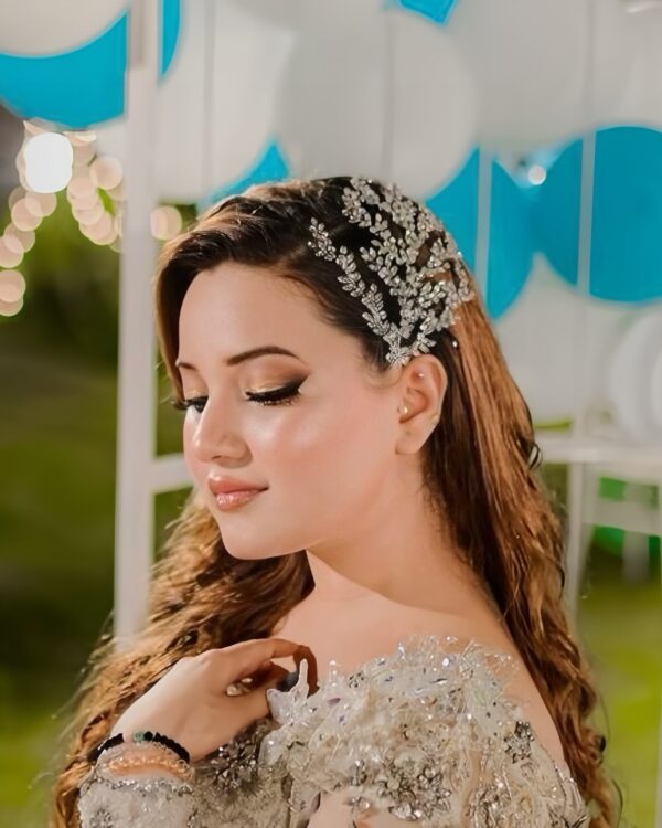 Rabecca Khan wearing our famous headpiece